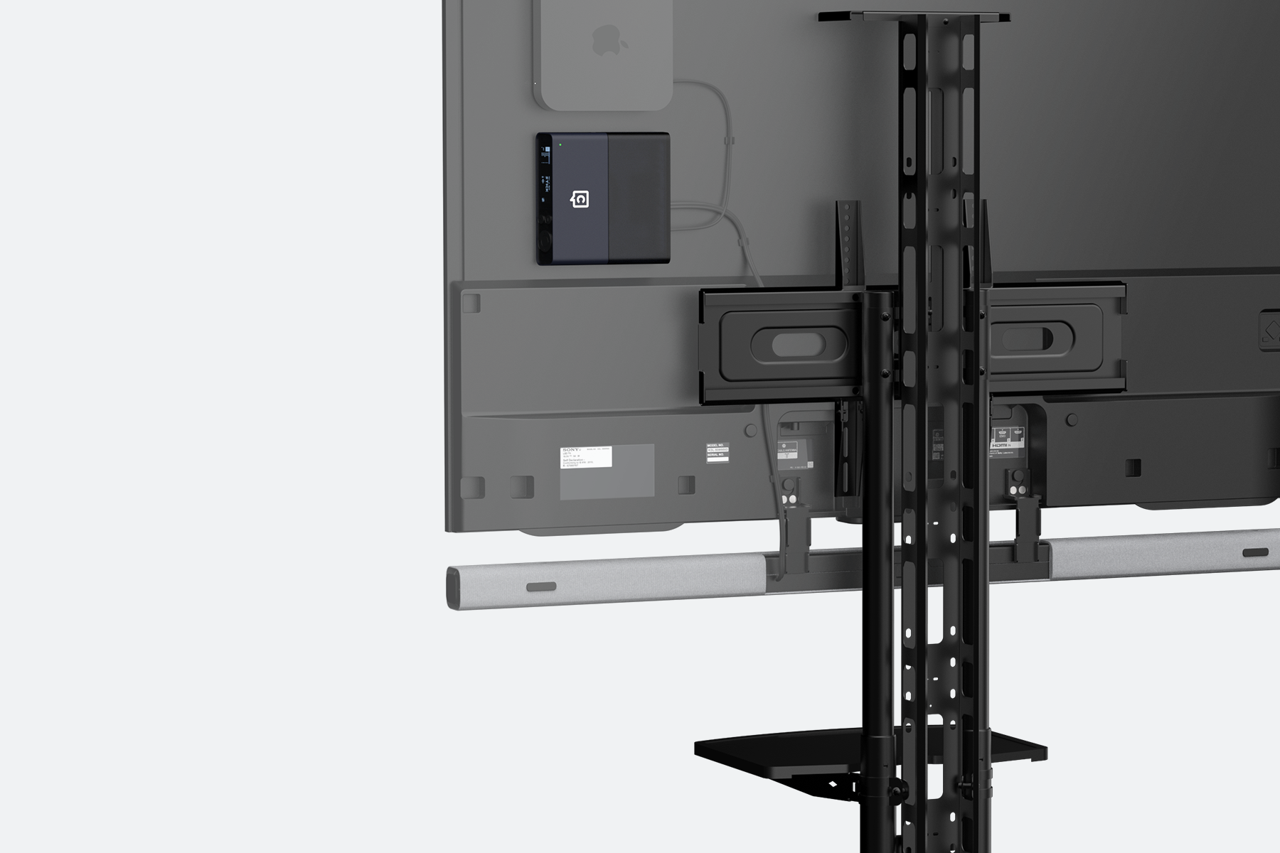 A Catchbox Plus Hub DSP mounted with a Mounting Kit behind a portable cart TV.