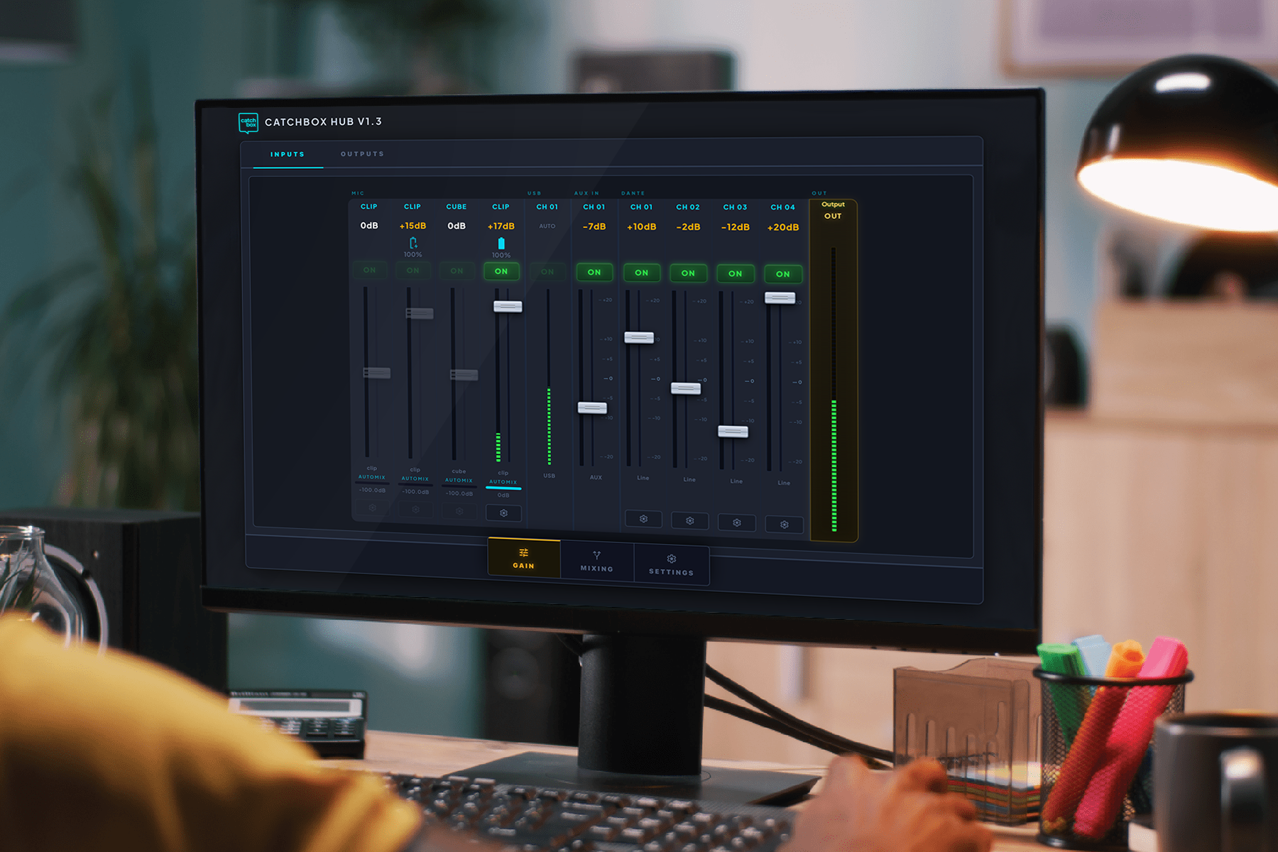 A monitor screen displaying the controls of the Catchbox Control and Monitoring Center, showcasing various settings and management tools for overseeing microphone systems.