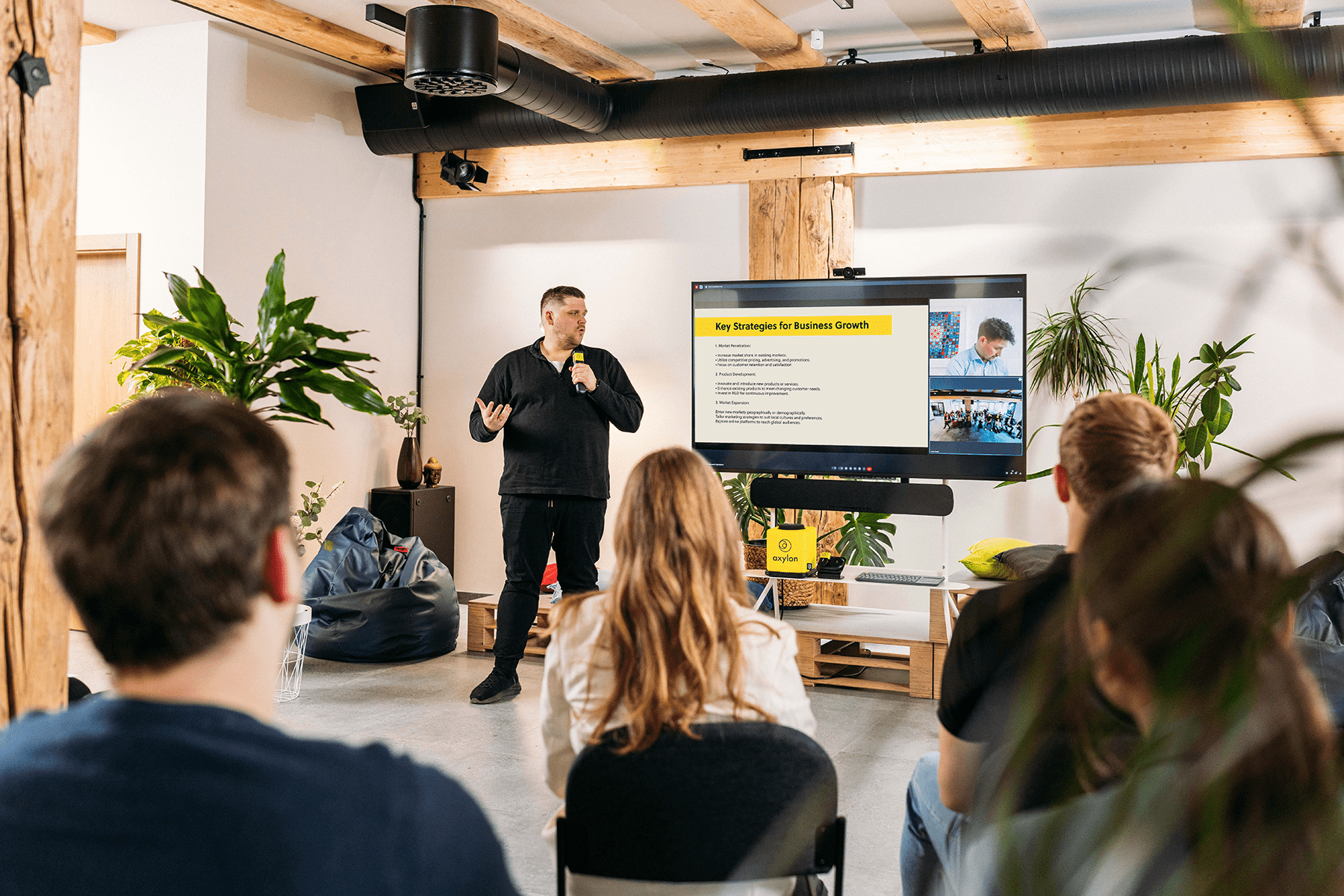 Hybrid all hands in the office and using Catchbox Plus as their audio solution