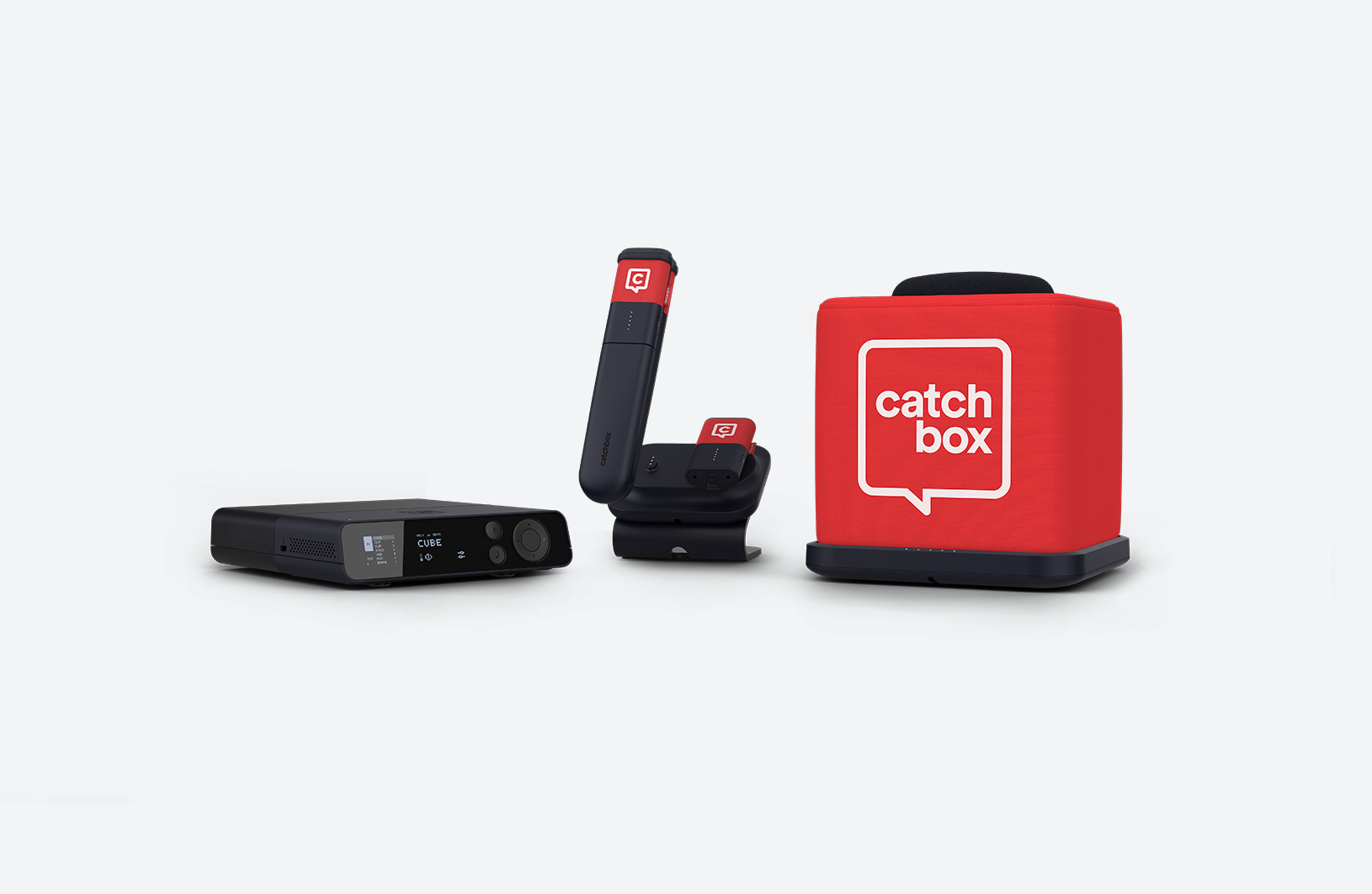 Catchbox Plus system with Hub DSP receiver, Stick handheld, Clip wearable mics placed on Charging Dock, Cube throwable mic on Charging Base.